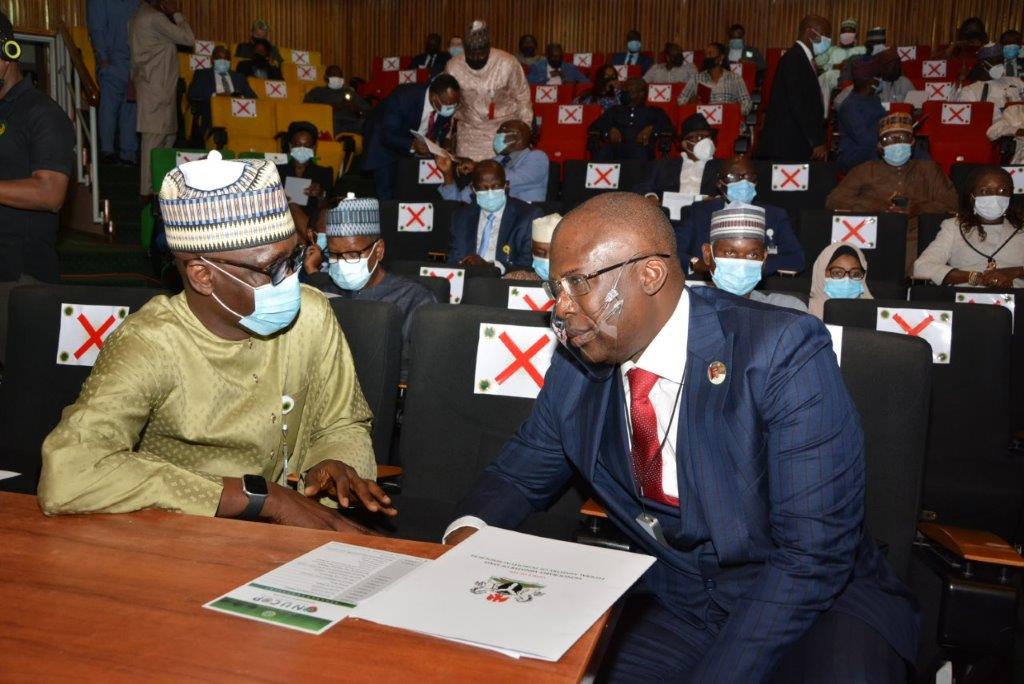 Minister of State for Petroleum Resources, Chief Timipre Sylva, and NNPC GMD, Mallam Mele Kyari, conferring during the launch of the Nigerian Upstream Cost Optimisation Programme (NUCOP) held to rally oil and gas industry stakeholders to achieve the $10 per barrel production cost target by adopting cost reduction measures... Tuesday.