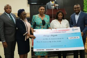 Dr. Abiodun Muritala, AG/PS of Lagos State Treasury Office; Mrs. Yetunde Ilori, Director-General Nigeria Insurer Association; Representative of HOS/ Permanent Secretary, Public Service Office, Mrs. Olasunkanmi Oyegbola, One of beneficiaries, Adenuga Adeyinka and Commissioner for Finance, Dr. Rabiu Olowo during the presentation ceremony.