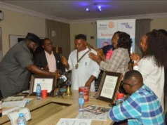 Rotary president urges sustained community service, hands over to successor